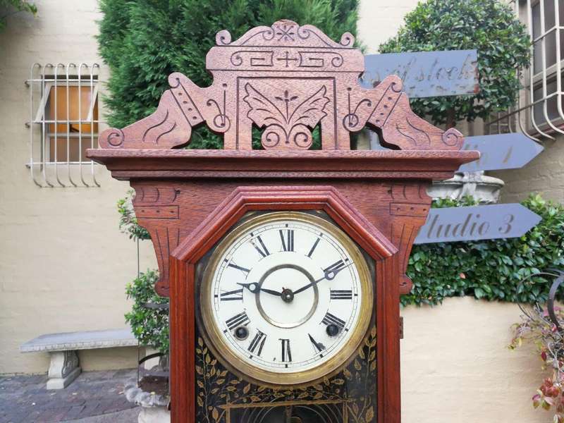 An Early 20th Century English Carved Walnut Mantel Clock
