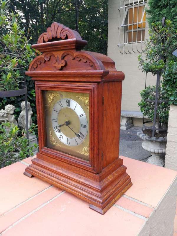 An Antique Oak French Mantel Clock