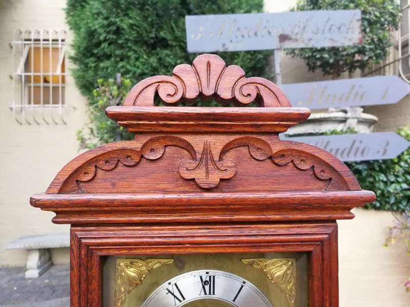 An Antique Oak French Mantel Clock