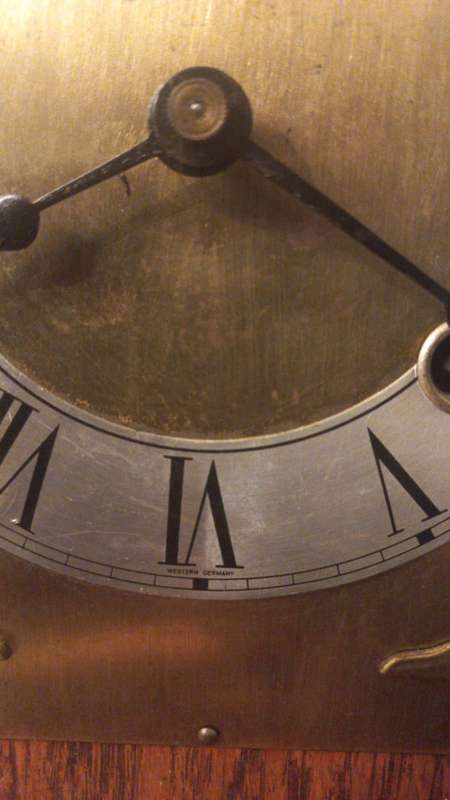 An Antique Oak French Mantel Clock