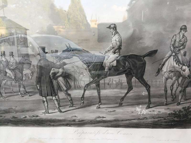 A Pair of Prints In Ornate Giltwood Frames. After Vernet La Course and Preparatifs Dune Course