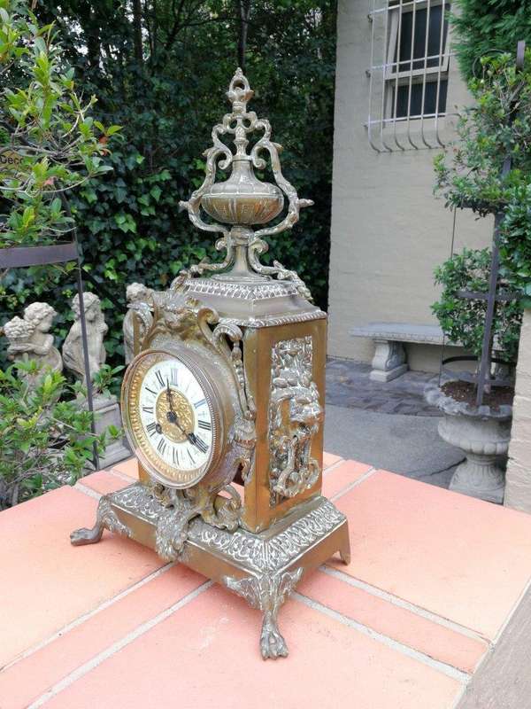 A late 19th/Early 20th Century French brass clock With Pendulum and Key