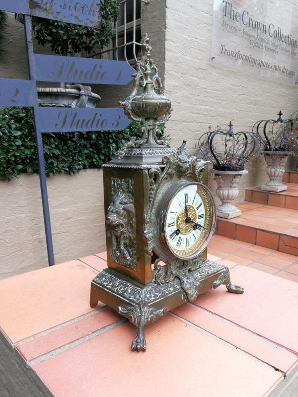 A late 19th/Early 20th Century French brass clock With Pendulum and Key