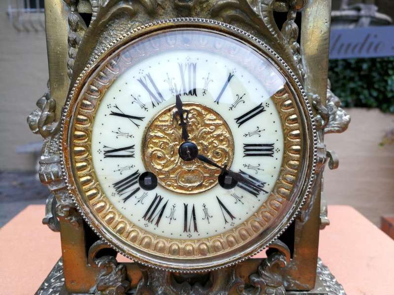 A late 19th/Early 20th Century French brass clock With Pendulum and Key