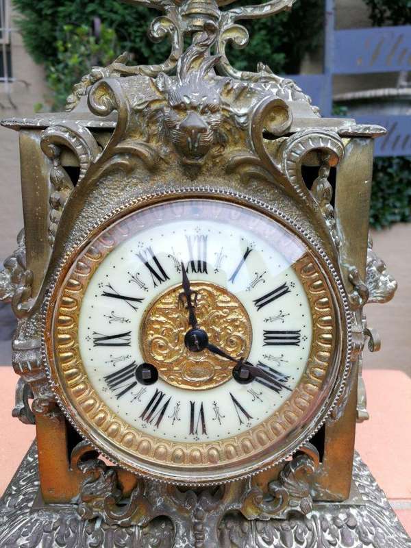 A late 19th/Early 20th Century French brass clock With Pendulum and Key