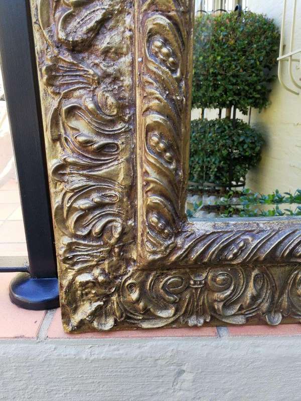 A Pair Of  20th Century Bevelled And Gilt-Painted Wooden Mirrors