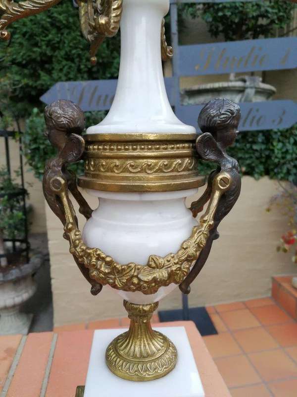 An Antique Circa Early 1900 Brass Garniture Clock Set with Key. Comprising a Clock and Pair of Ca...