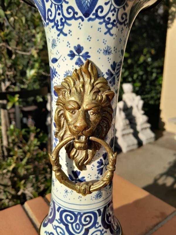 A 20th Century Dutch Delft Porcelain And Brass Candelabra