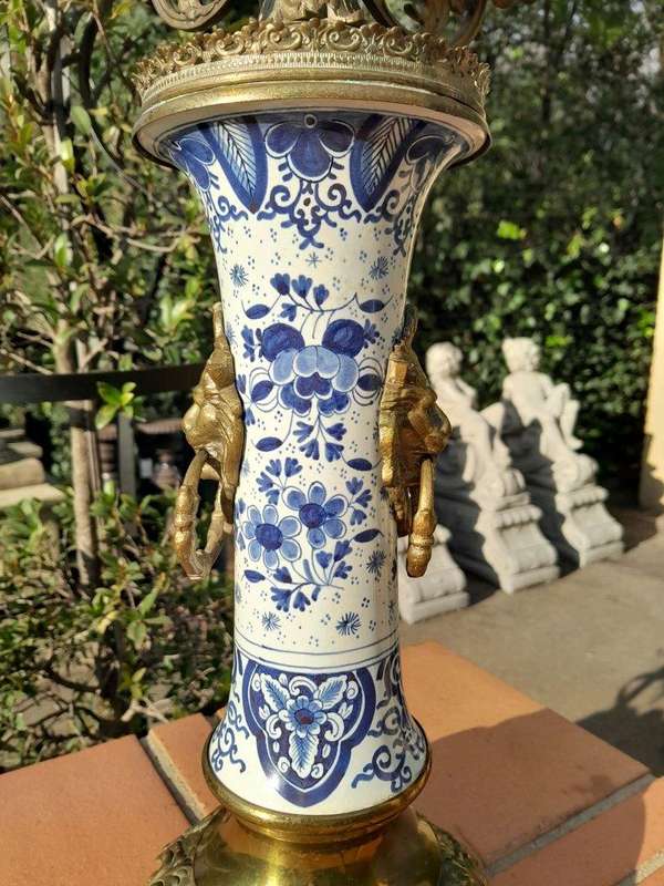 A 20th Century Dutch Delft Porcelain And Brass Candelabra