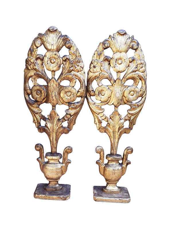 An Early 20TH Century Pair Of Gilt-Wood Carved Decorative Objects
