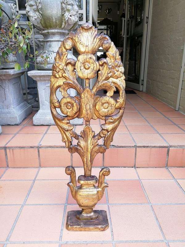 An Early 20TH Century Pair Of Gilt-Wood Carved Decorative Objects