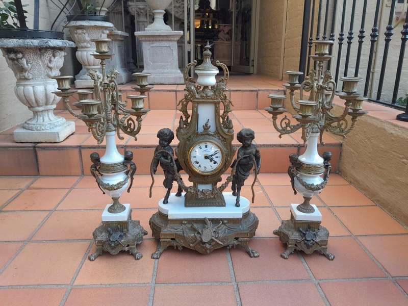 A 20th Century Brass Clock And Candelabrum Garniture Set