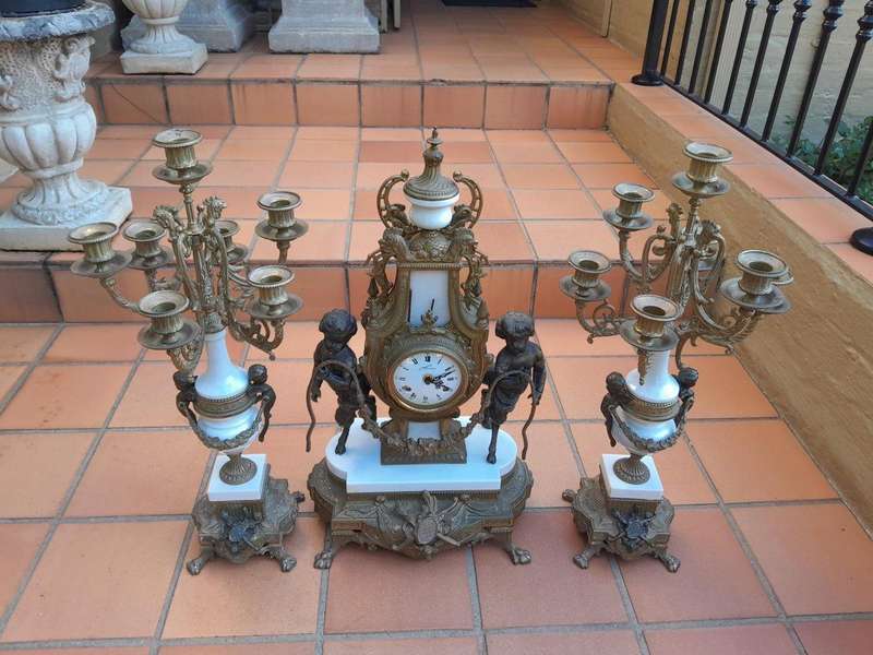 A 20th Century Brass Clock And Candelabrum Garniture Set