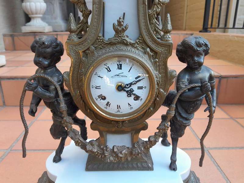 A 20th Century Brass Clock And Candelabrum Garniture Set