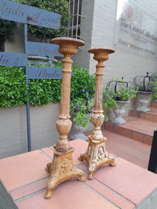 A 20th Century French Pair Of Cast Iron Candle Sticks