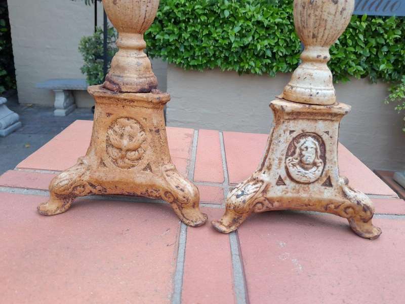 A 20th Century French Pair Of Cast Iron Candle Sticks