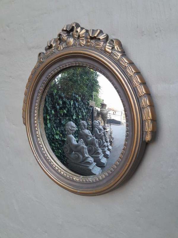 A 20th Century Gilt Painted Concave Mirror