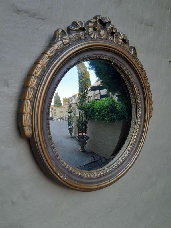 A 20th Century Gilt Painted Concave Mirror