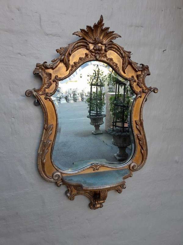 A 19th Century Giltwood And Bevelled Mirror With Shelf