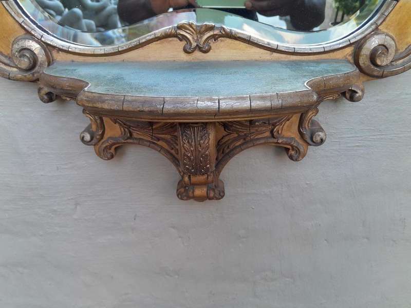 A 19th Century Giltwood And Bevelled Mirror With Shelf
