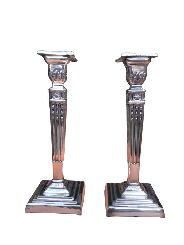 A Pair Of Electroplate Candlesticks