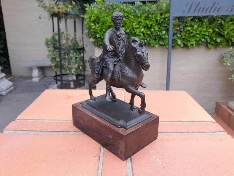 A Bronze Male Figurine On Horseback On Wooden Base In A Glass Cloche