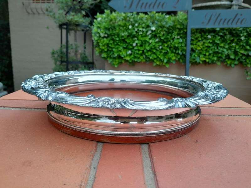 An Early 19th Century Electroplate Champagne Coaster On Wooden Base