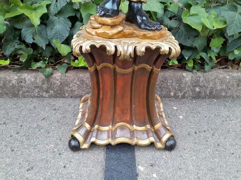 A 20th Century Highly Decorative Giltwood Blackamoor On Base Holding Bowl