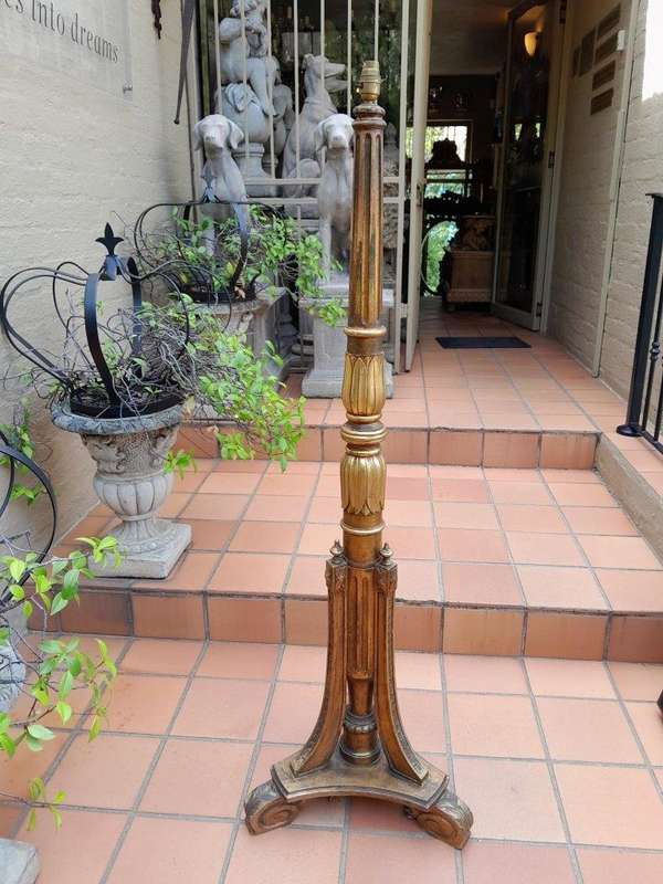 An Ornate Giltwood Column Standing Lamp