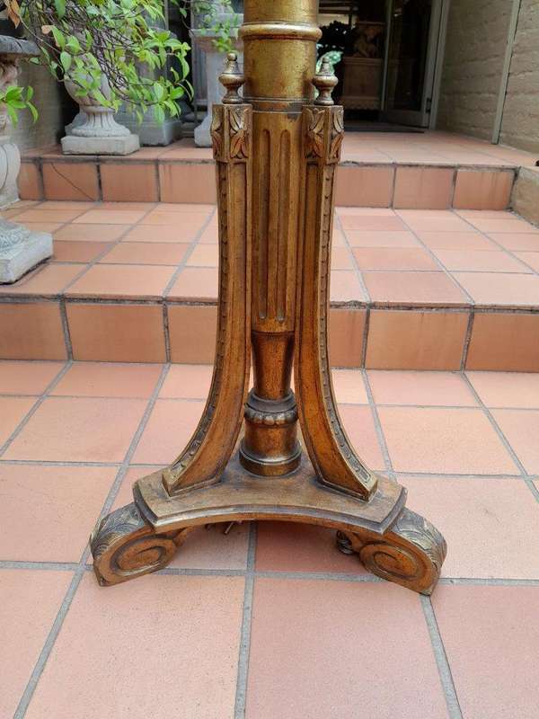 An Ornate Giltwood Column Standing Lamp