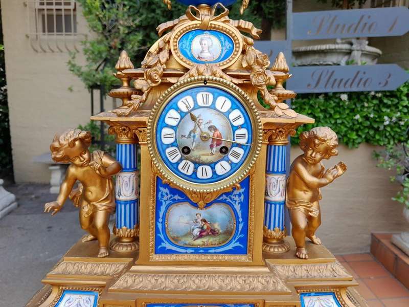 A 19th Century French Sevres And Gilt Metal Clock With Eight Day Key Wound Bell