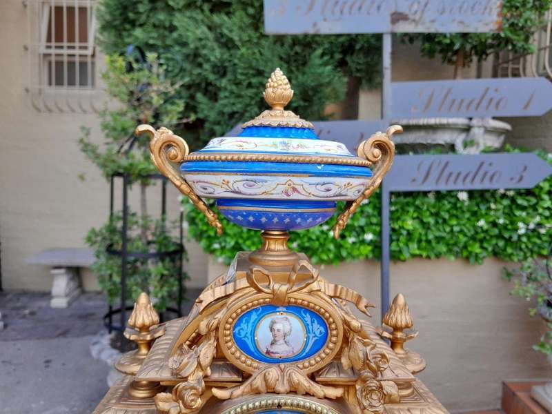 A 19th Century French Sevres And Gilt Metal Clock With Eight Day Key Wound Bell