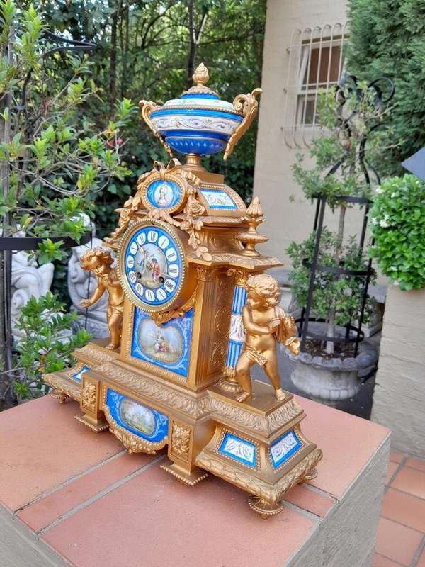 A 19th Century French Sevres And Gilt Metal Clock With Eight Day Key Wound Bell