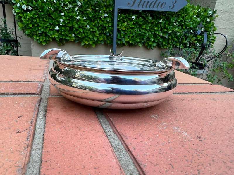 A Christofle Silver Plated Bottle Coaster, And A Silver Plated Ashtray
