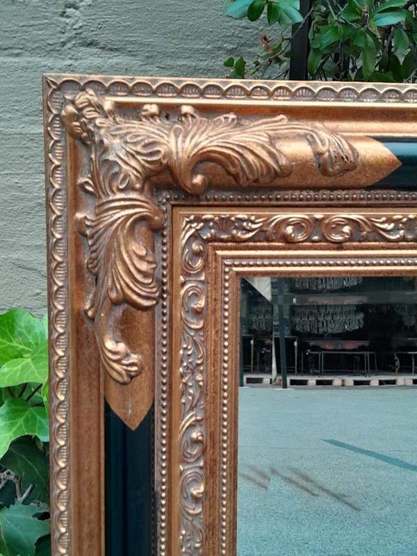 A 20th Century Pair Of French Empire-Style  Ebonised And Gilt-Painted Mirrors