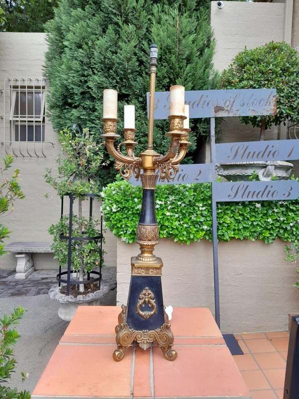 A Mid 20th Century Pair Of French Empire Style Black Metal And Brass Gilt Painted Candelabra Lamps