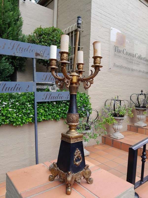 A Mid 20th Century Pair Of French Empire Style Black Metal And Brass Gilt Painted Candelabra Lamps