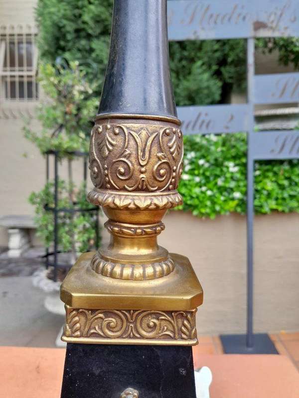 A Mid 20th Century Pair Of French Empire Style Black Metal And Brass Gilt Painted Candelabra Lamps