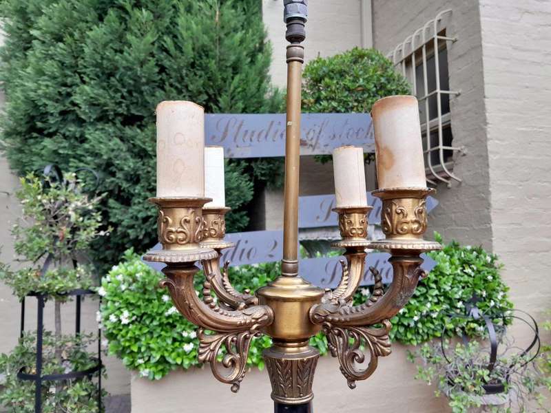 A Mid 20th Century Pair Of French Empire Style Black Metal And Brass Gilt Painted Candelabra Lamps