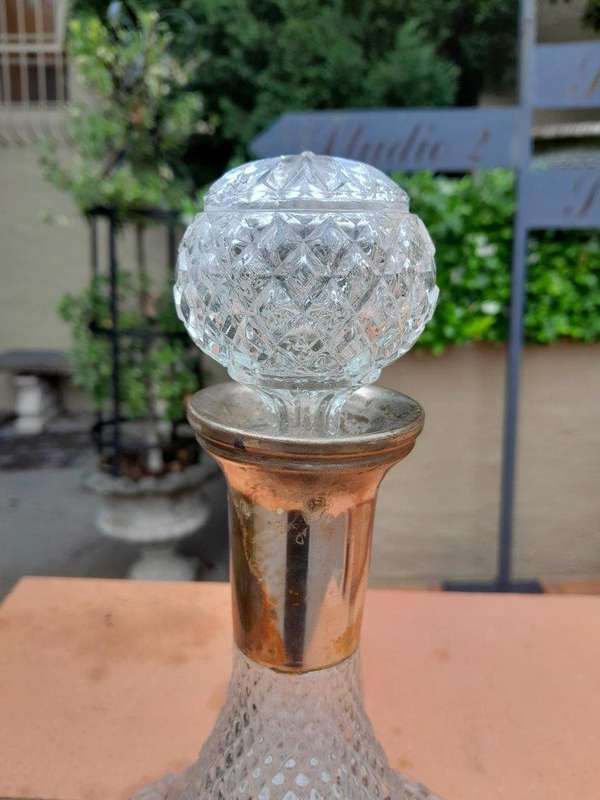 A Hand Blown Crystal Decanter With Stopper