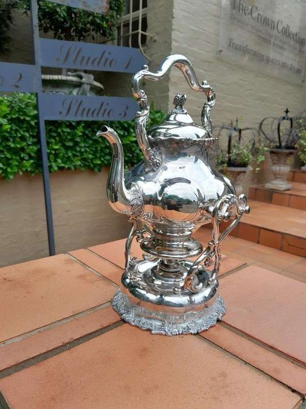 A 20TH Century Silver Plate Kettle on Stand with Burner