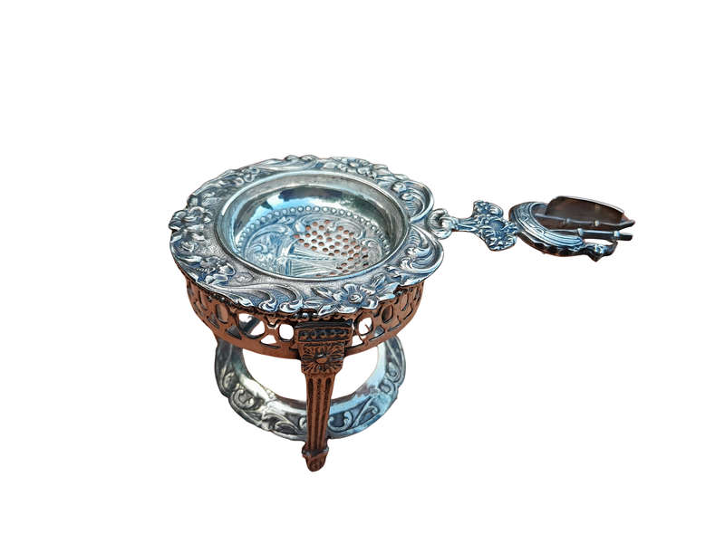 A 20TH Century Dutch Hallmark Silver Tea Strainer On Stand