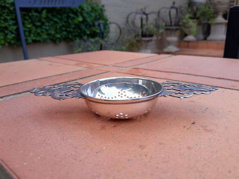 A 20th Century Circa 1965 English Sterling Silver Hallmarked Tea Strainer with Holder - England ...