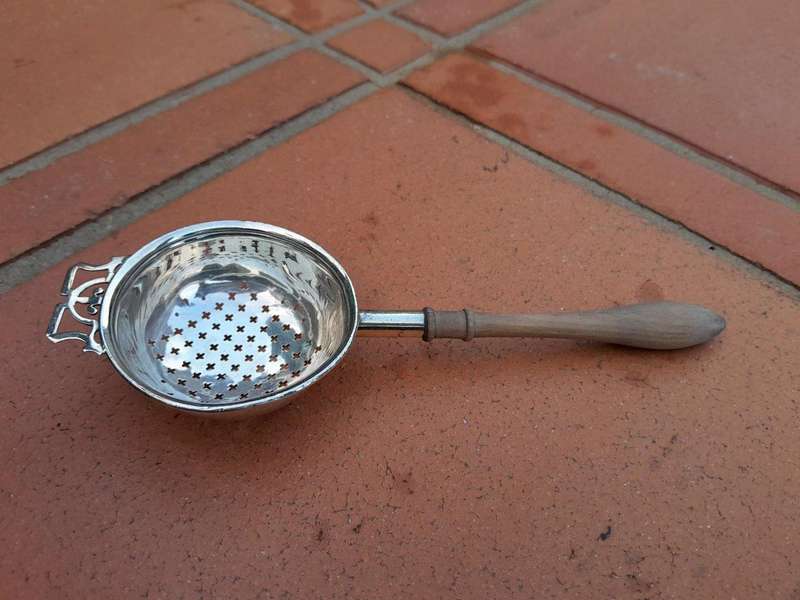A  20TH Century Silver Hallmarked Tea Strainer with wooden handle Birmingham 1966 - Elkington an...