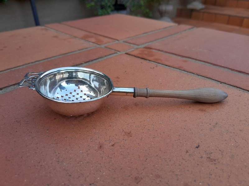 A  20TH Century Silver Hallmarked Tea Strainer with wooden handle Birmingham 1966 - Elkington an...