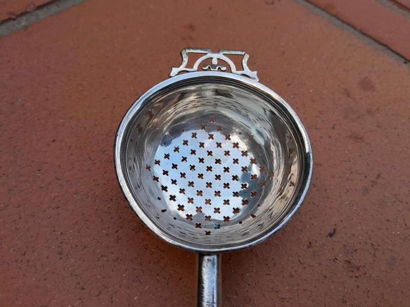 A  20TH Century Silver Hallmarked Tea Strainer with wooden handle Birmingham 1966 - Elkington an...