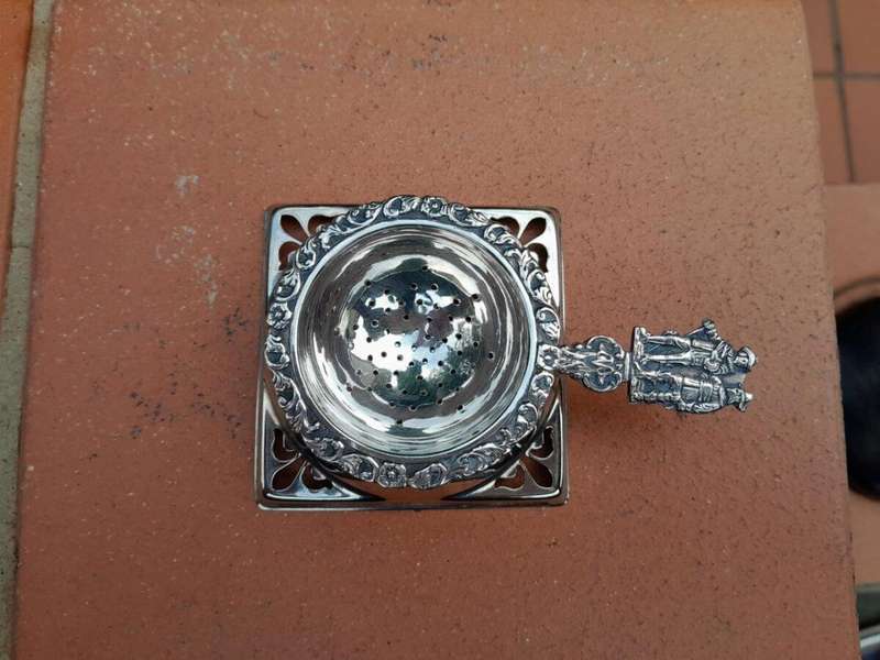 A Silver Plated Tea Strainer English