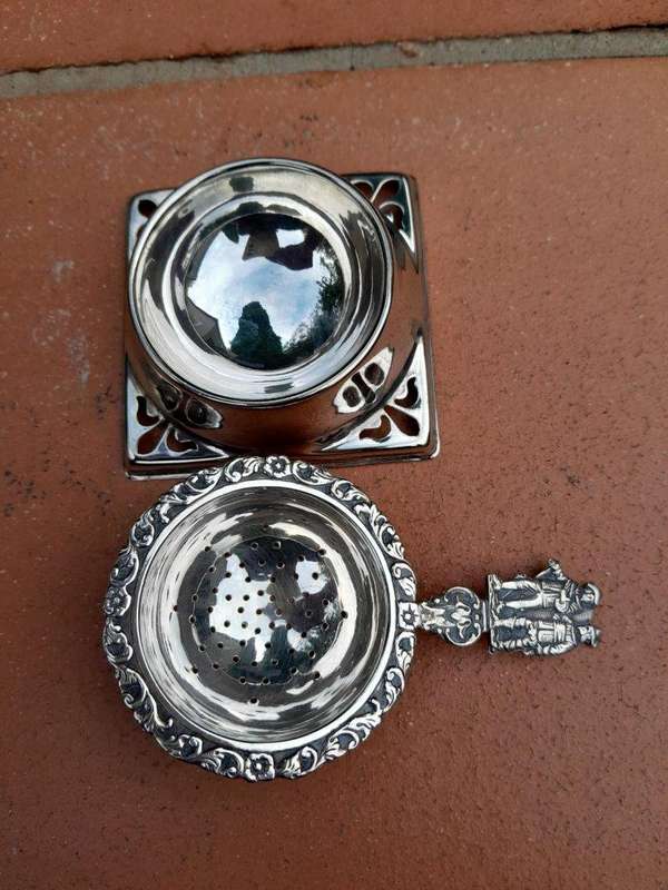 A Silver Plated Tea Strainer English