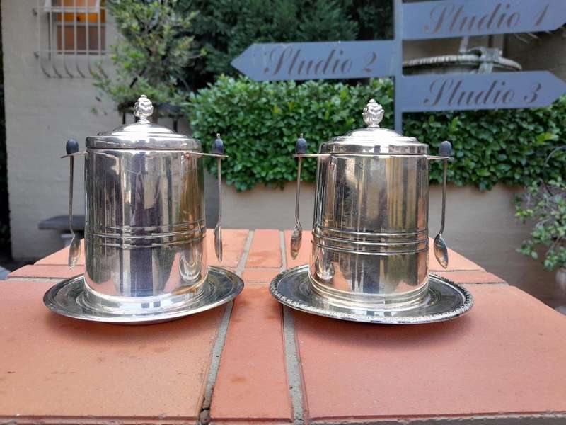 A Rare Pair of Silver Plate Tea Caddies (Regular and Decaf Tea)  each with Two Teaspoons with Re...