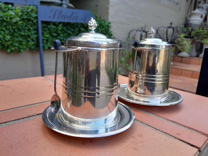 A Rare Pair of Silver Plate Tea Caddies (Regular and Decaf Tea)  each with Two Teaspoons with Re...